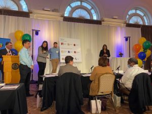 Maya Ragavan pitches at University Club ballroom