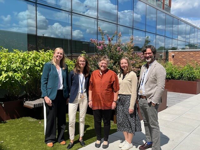 Jennifer Collinger, Elvira Pirondini, Sue Hunter, Jordyn Ting and Marco Capogrosso in the outdoor courtyard at the Vision Institute.